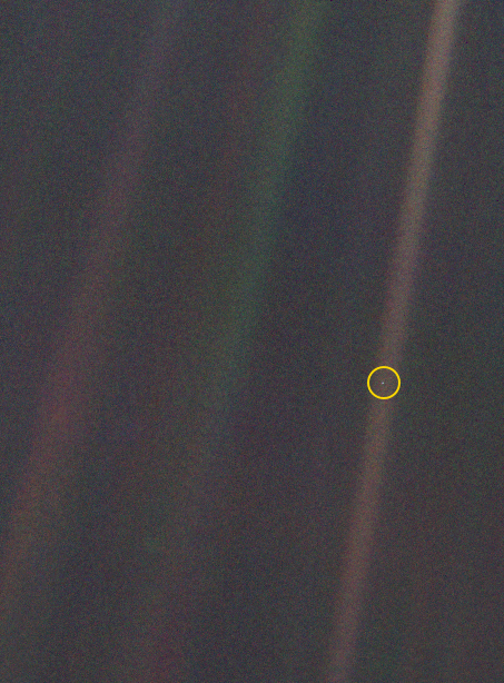 Pale blue dot with yellow circle